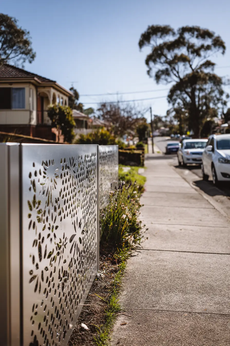 Modern Laser-Cut Metal Fence for Driveways
